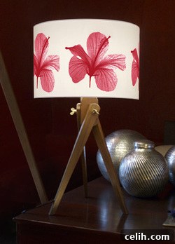 Plum Chutney's Botanic Table Tripod Lamp featuring a red hibiscus flower print.