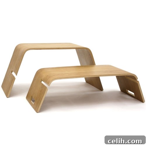 Two separate modern oak coffee tables, demonstrating the modular functionality of the Embrace design.