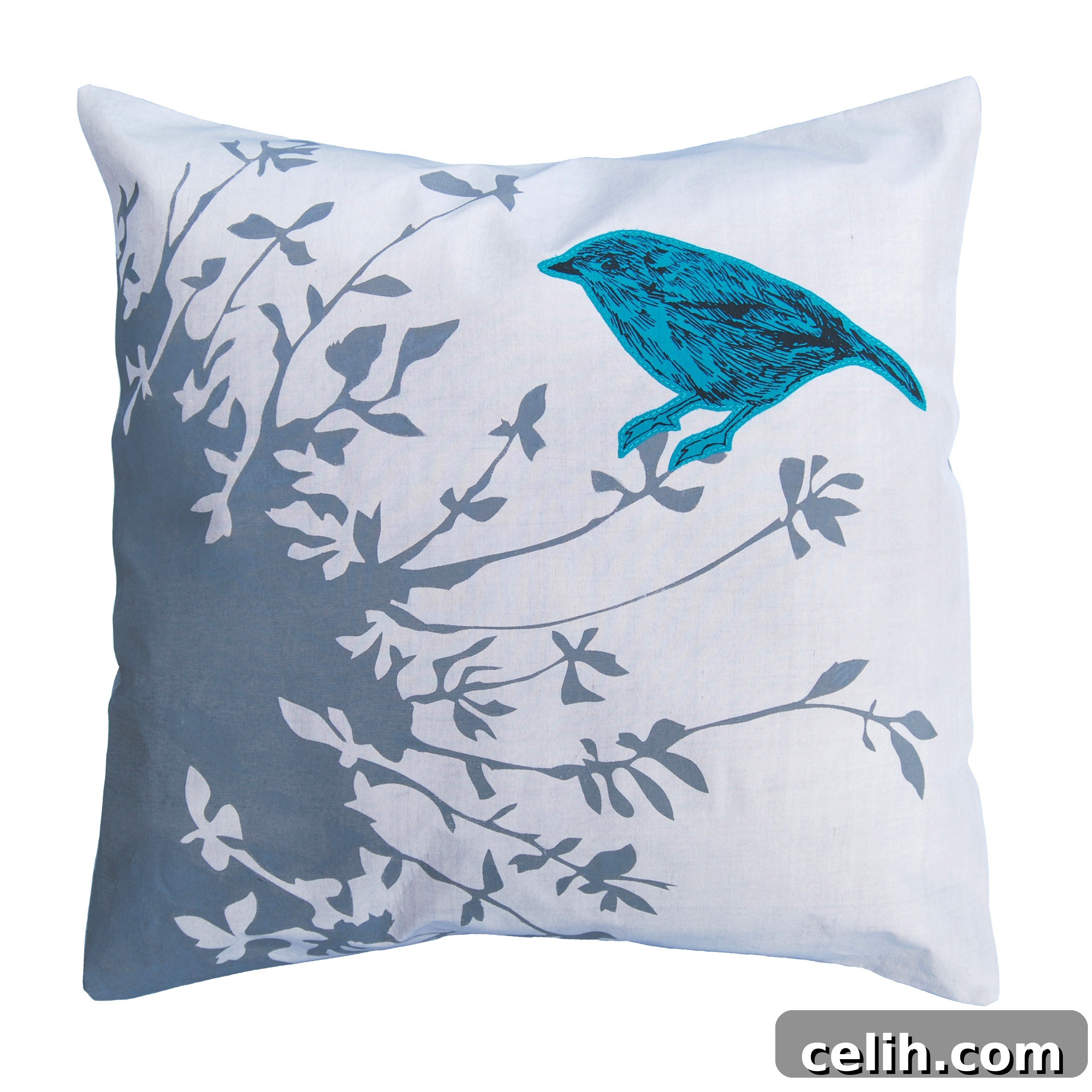 Perch Cushion - Vibrant Bird Decor The Perch Cushion by Katie & The Wolf, showcasing a brightly coloured turquoise bird on a leafy bush, perfect for adding a pop of colour to any room.