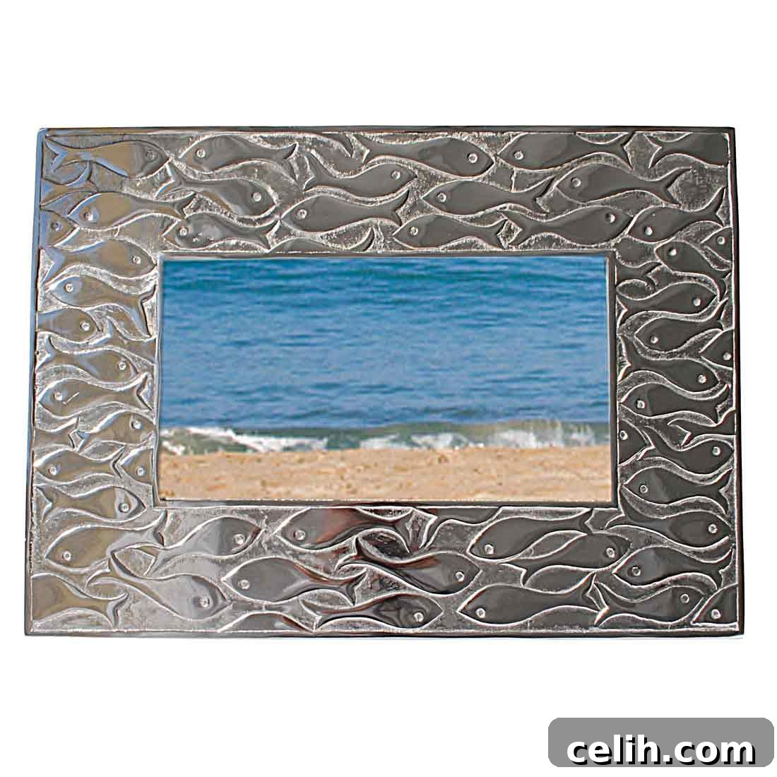 Large silver metal mirror with shoaling fish embossed design